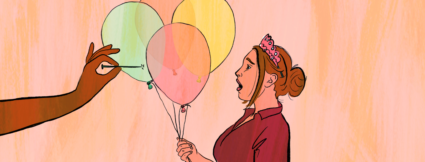 A woman wearing a tiara and holding birthday balloons is stunned as she watches are hand holding a large needle move closer to one of her balloons.